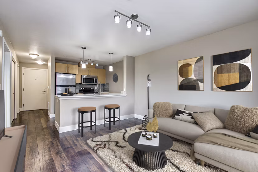 Spacious living room with modern decor in 1611 on Lake Union Apartments