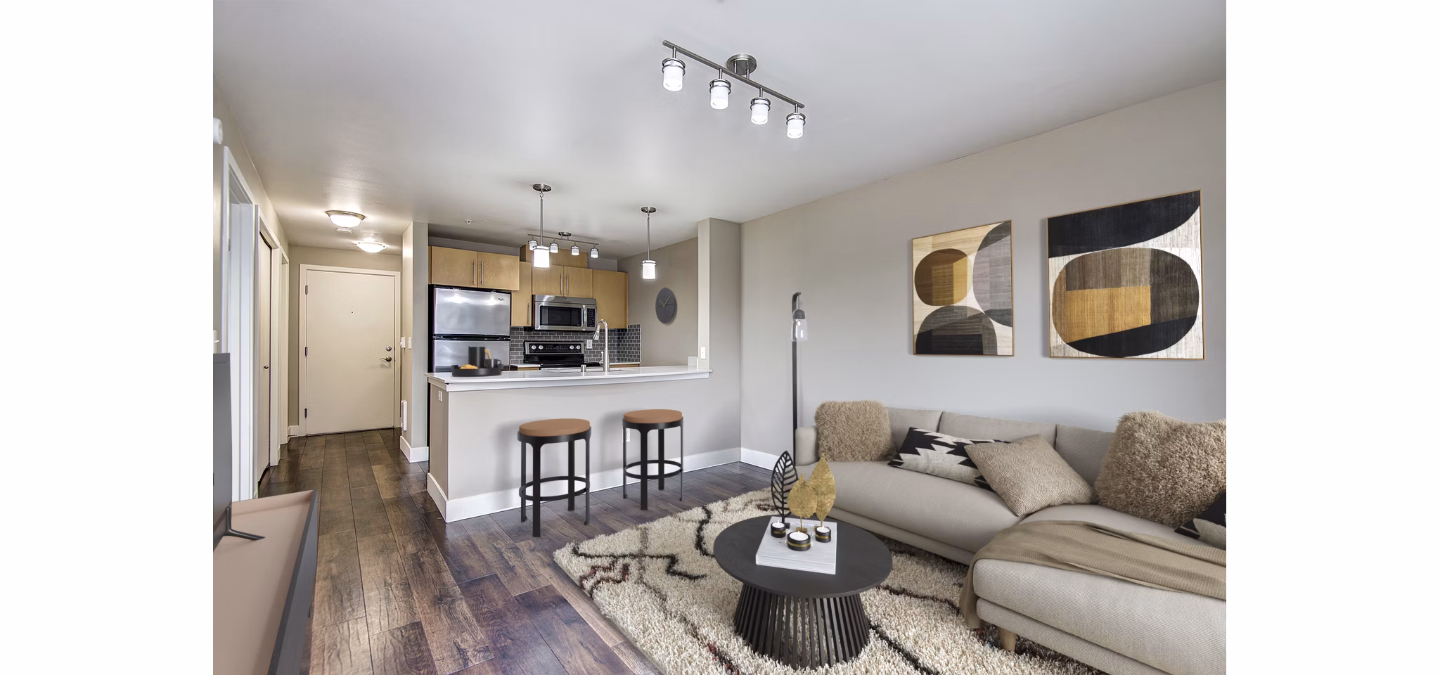 Spacious living room with modern decor in 1611 on Lake Union Apartments