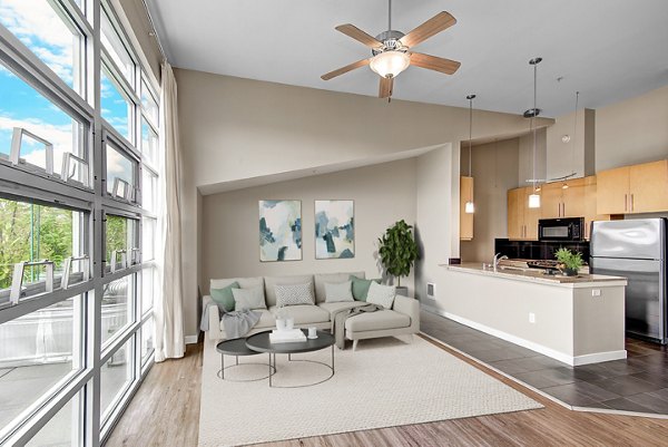 Spacious living room with modern decor at 1611 on Lake Union Apartments