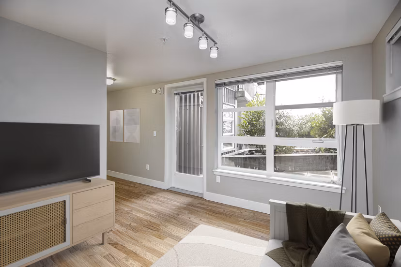Modern living room with stylish furniture in 1611 on Lake Union Apartments, luxury residences with lake views