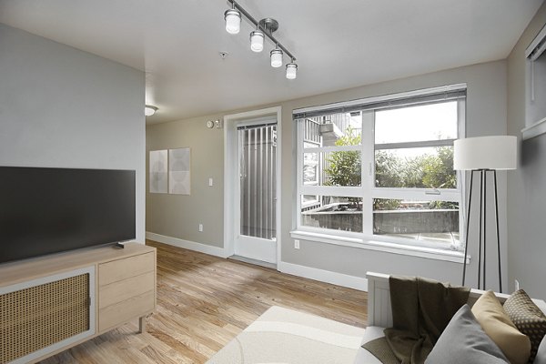 Modern living room with stylish furniture in 1611 on Lake Union Apartments, luxury residences with lake views