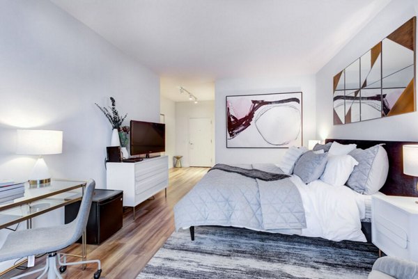 Bedroom featuring contemporary design and modern furnishings at SoNo East Apartments, in Chicago's luxury rental community
