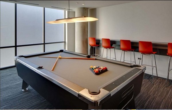 Game room with modern furnishings at SoNo East Apartments