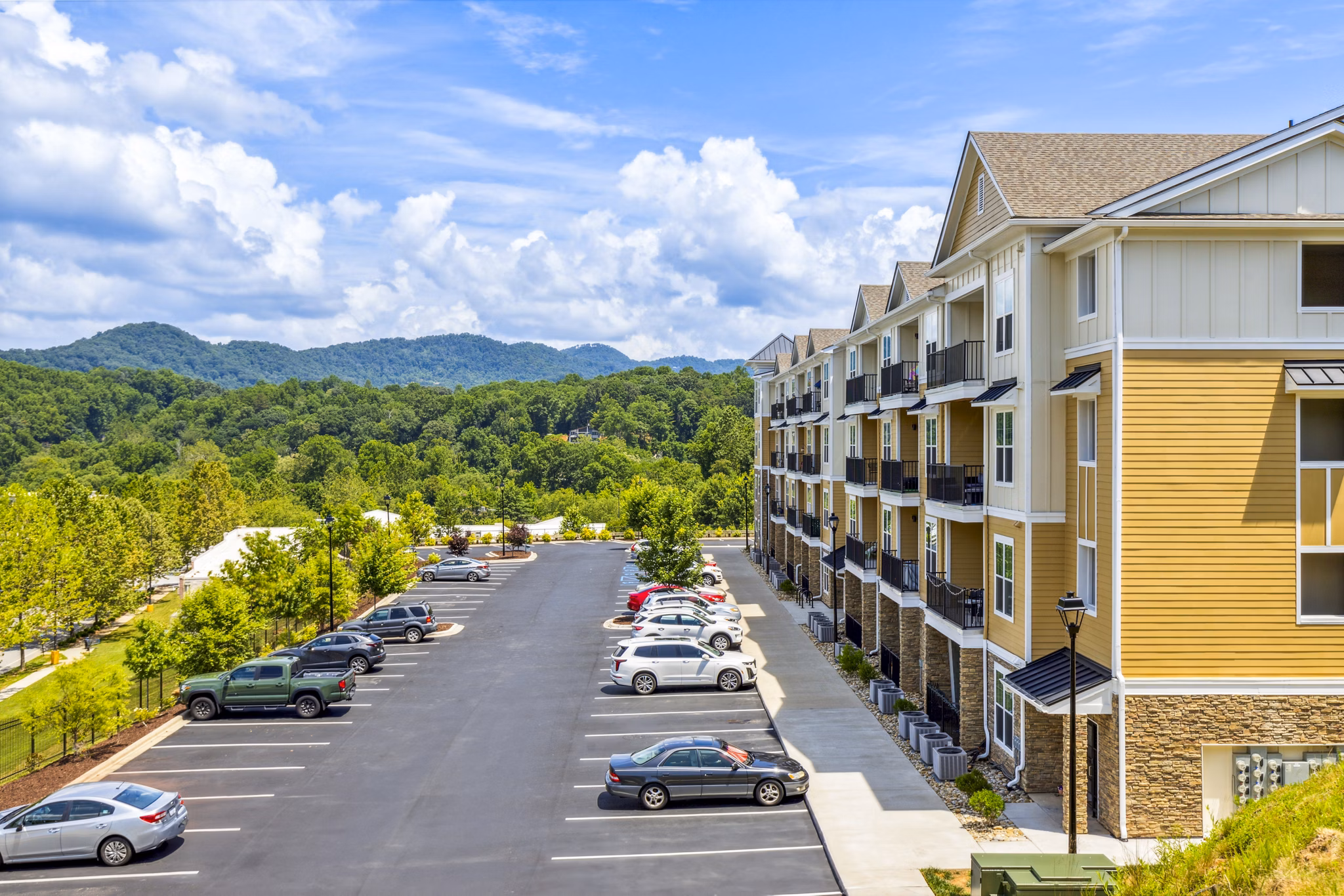 Verde Vista Apartments: Elegant view of luxury high-rise nestled in lush greenery