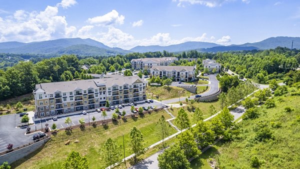 Verde Vista Apartments: Luxury mid-rise building with modern design elements in a scenic urban setting