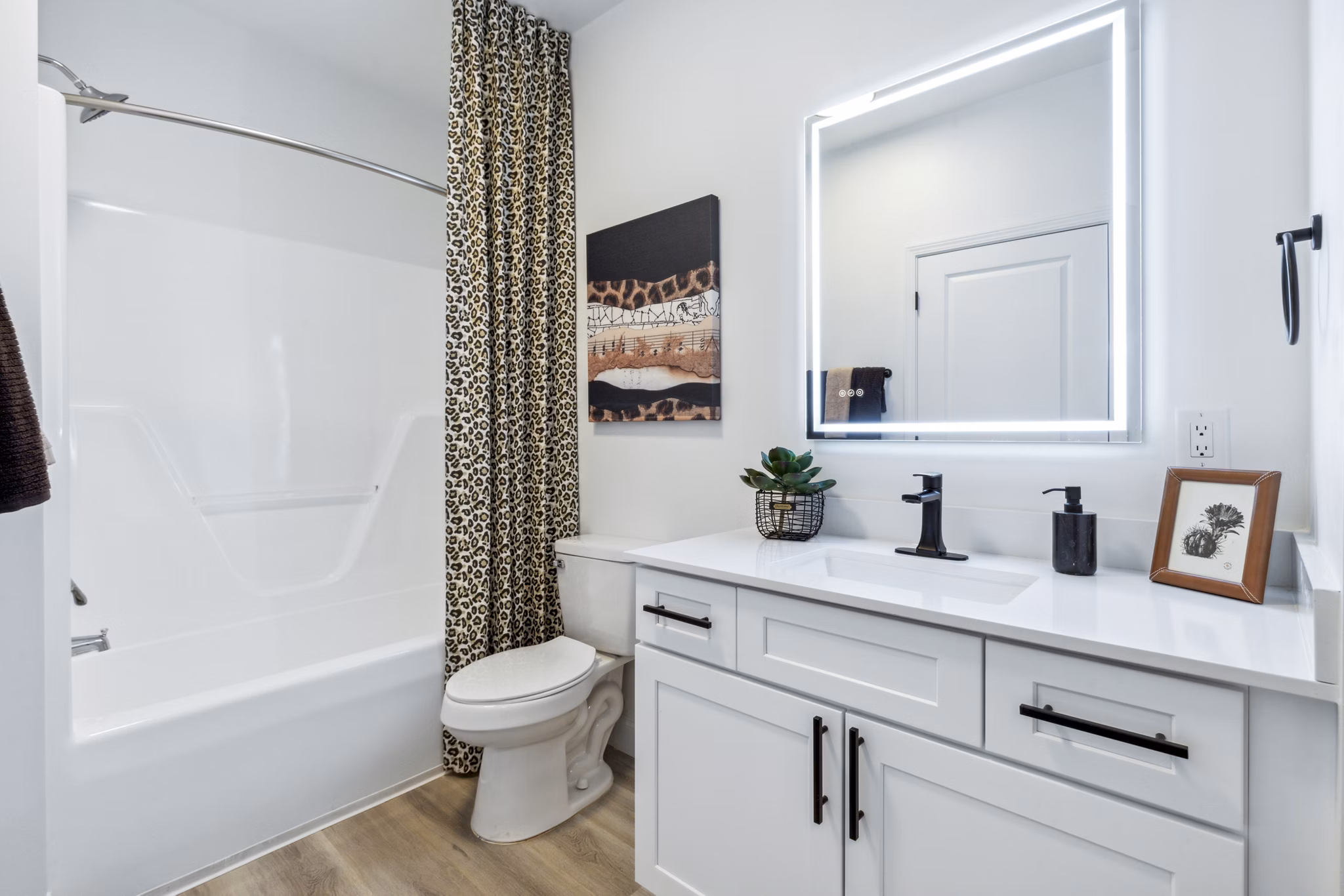 Bathroom with sleek fixtures and modern design at Verde Vista Apartments