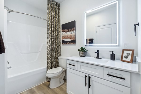 Bathroom with sleek fixtures and modern design at Verde Vista Apartments