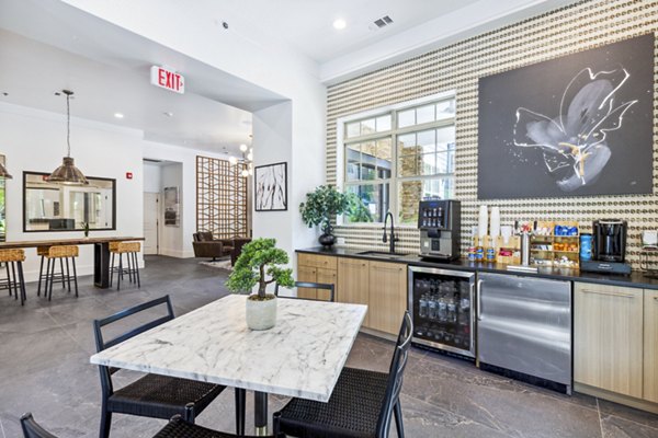 Modern clubhouse with elegant furnishings at Verde Vista Apartments, ideal for social gatherings and relaxation