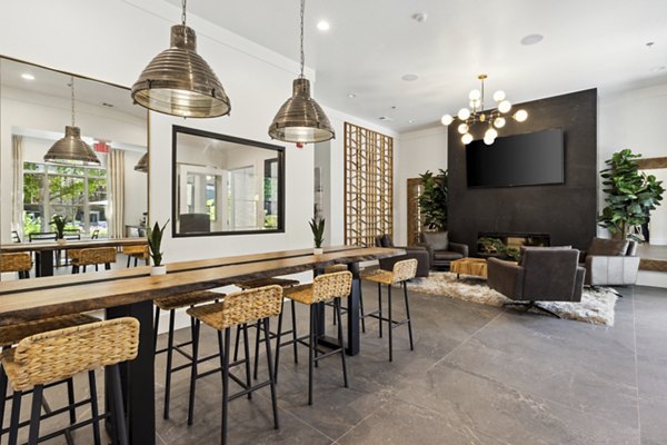Clubhouse at Verde Vista Apartments offers upscale amenities including a modern lounge and entertainment space tailored for luxury living