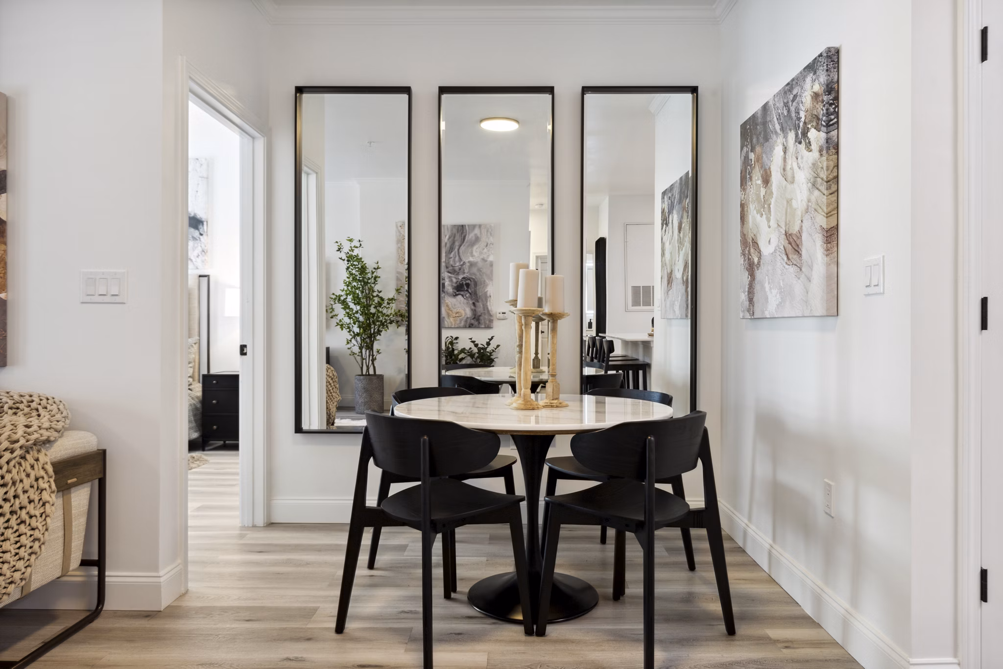 Elegant dining area with modern seating and ambient lighting at Verde Vista Apartments