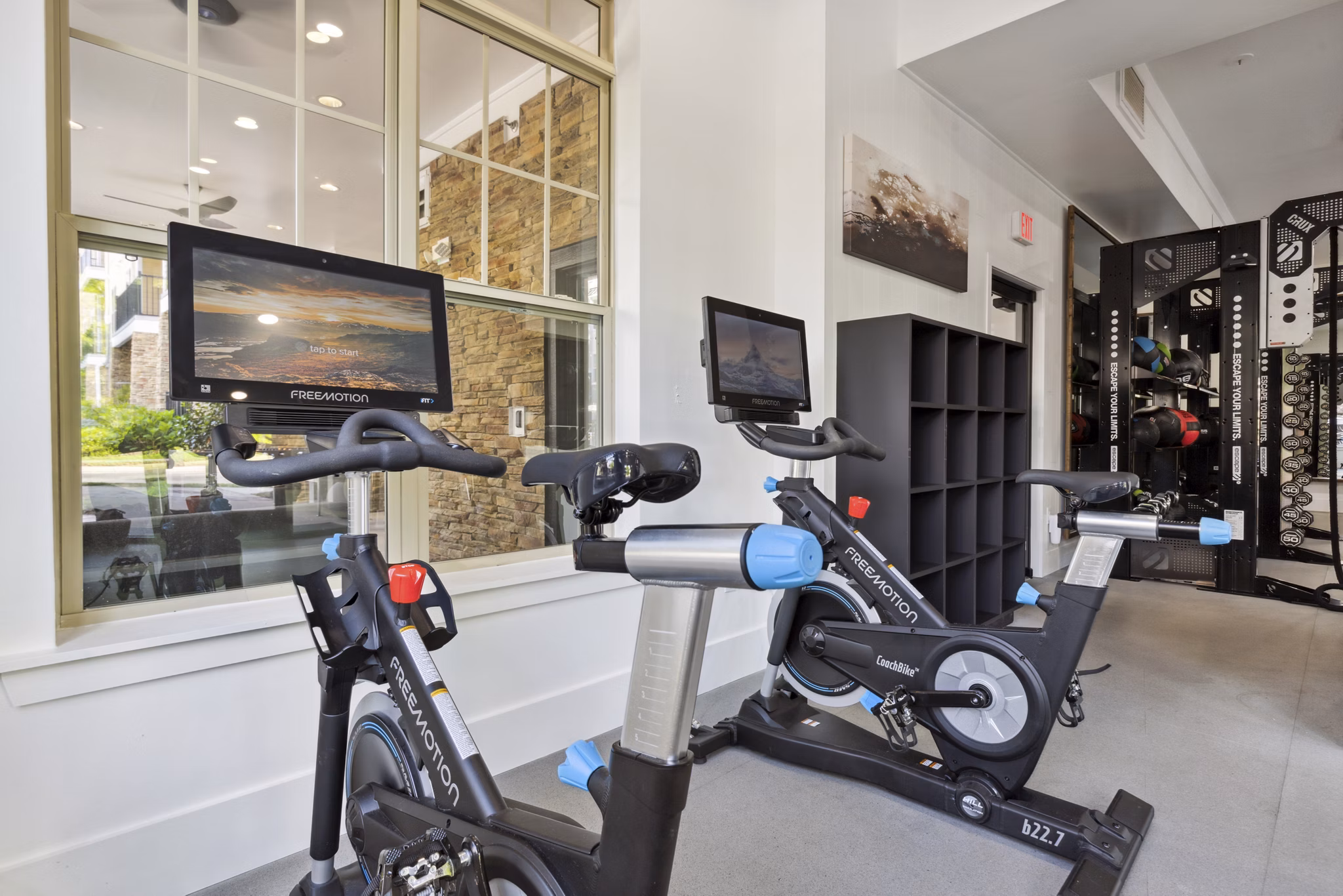 State-of-the-art fitness center with modern equipment at Verde Vista Apartments, offering luxury workout spaces for residents