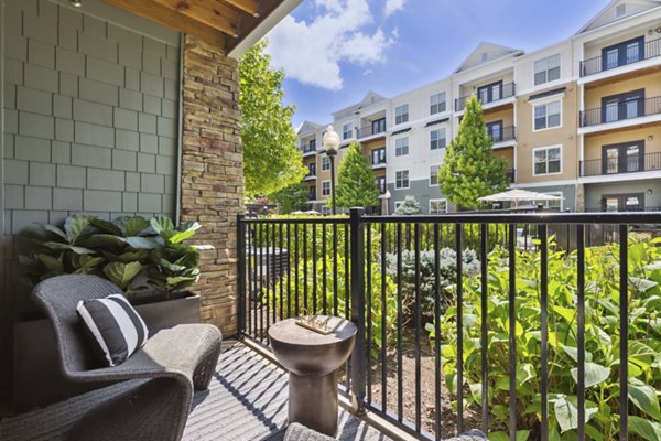 Spacious patio with modern furniture at Verde Vista Apartments, ideal for outdoor relaxation and enjoying luxury at Greystar's community