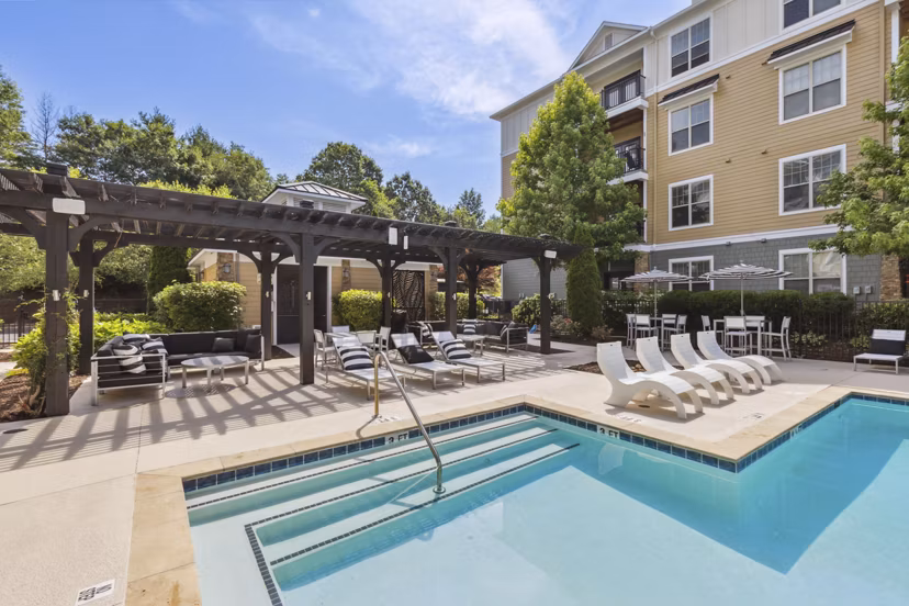 Resort-style pool surrounded by cabanas at Verde Vista Apartmentsâ€°Ã›Ã’modern luxury living