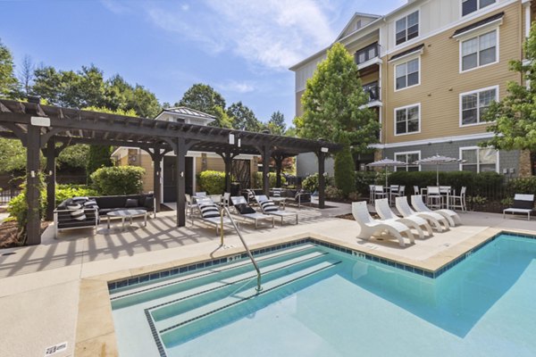 Resort-style pool surrounded by cabanas at Verde Vista Apartmentsâ€°Ã›Ã’modern luxury living