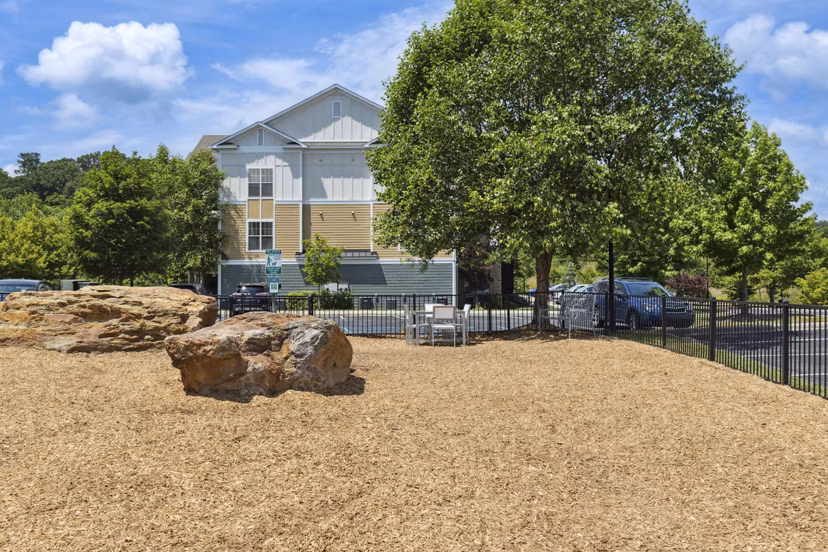 Spacious dog park at Verde Vista Apartments offering open play areas for pets