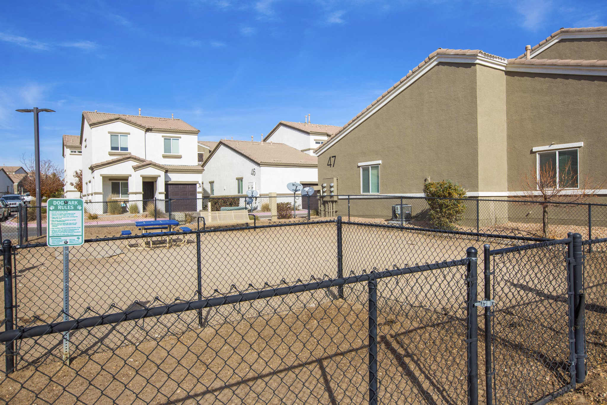Dog park featuring agility equipment at Diamond Mesa Apartments, a luxury pet-friendly space in the Greystar community