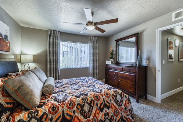 Cozy bedroom with modern furnishings at Allure at Tempe Apartments