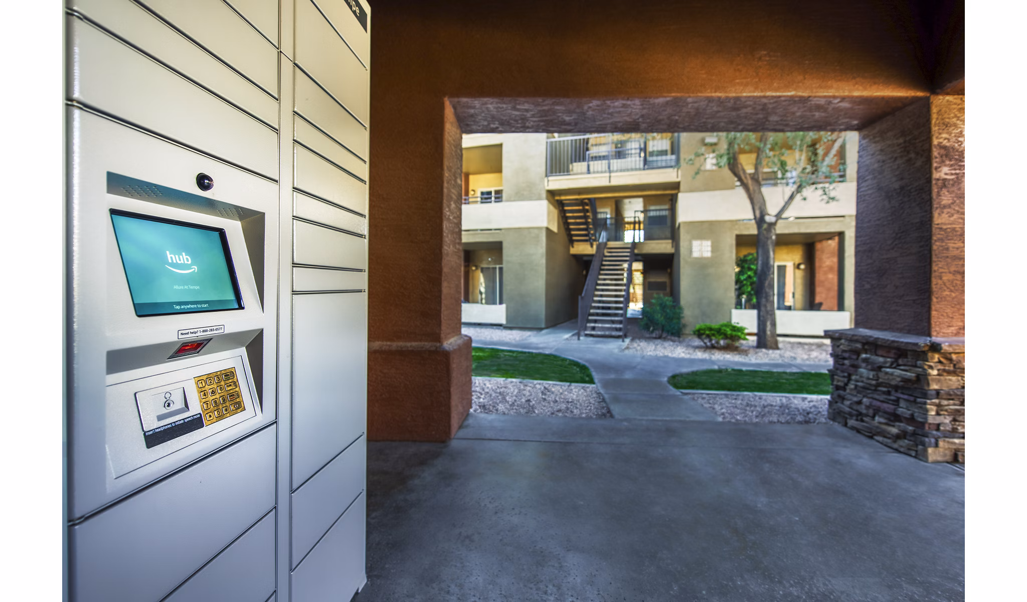 Clubhouse with parcel pickup area at Allure at Tempe Apartments, a featured amenity for residents seeking convenience