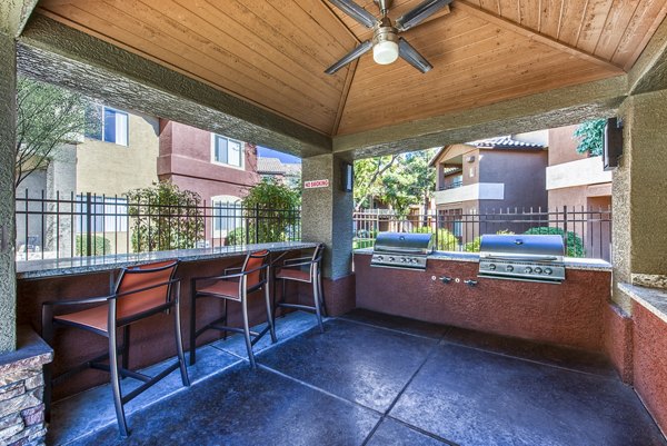 Grill area with modern outdoor seating at Allure at Tempe Apartments, a Greystar luxury apartment community in Tempe
