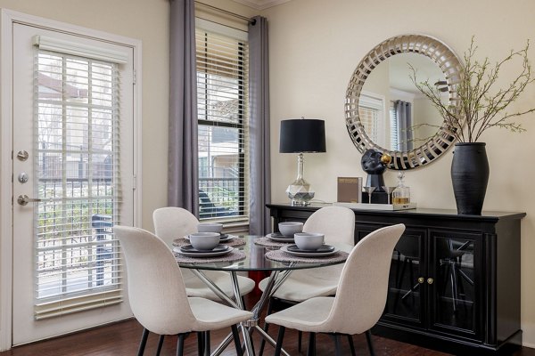 Dining room with contemporary design and elegant lighting at Ladera Apartments luxury apartments