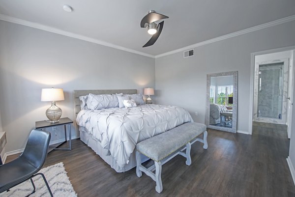 Spacious bedroom with modern decor at Barton Creek Villas Apartments, located in a luxurious Greystar-managed property