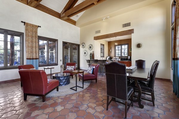Clubhouse featuring modern design and cozy seating at Barton Creek Villas Apartments
