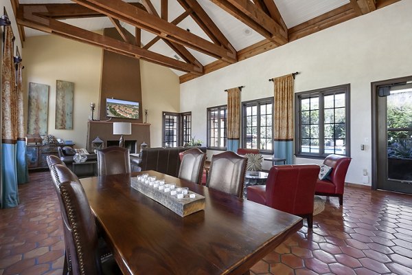 Clubhouse with modern design and plush seating at Barton Creek Villas Apartments, offering residents a luxury communal space for relaxation and events
