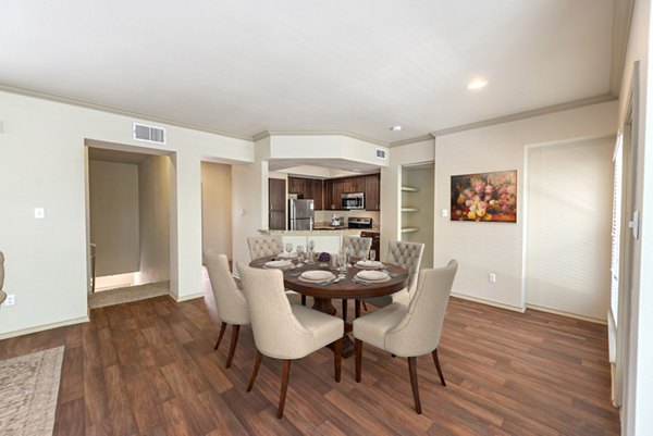 Elegant dining area with modern furnishings at Barton Creek Villas Apartments, perfect for gatherings and fine dining experiences