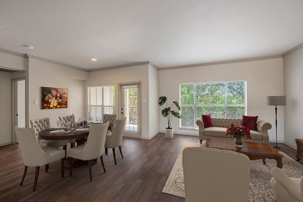 Dining area featuring elegant furnishings and modern lighting in Barton Creek Villas Apartments, a luxury Greystar property