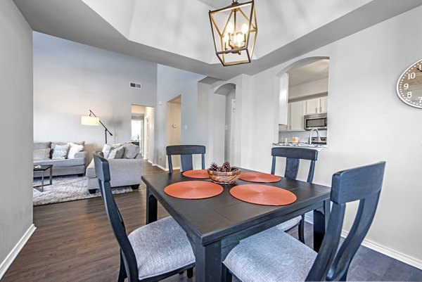 Elegant dining area with modern lighting at Barton Creek Villas Apartments