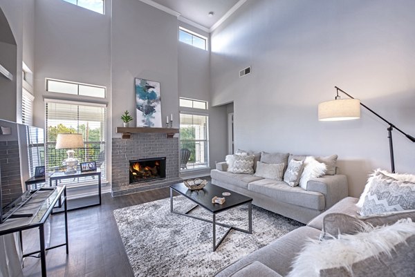 Spacious living room with modern finishes at Barton Creek Villas Apartments