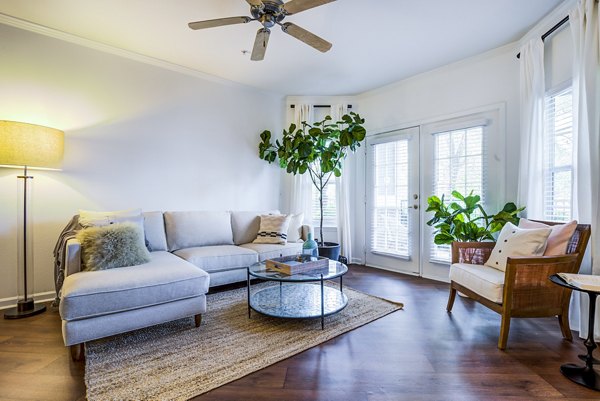 Bright living room with elegant decor at The Vinoy at Innovation Park Apartments