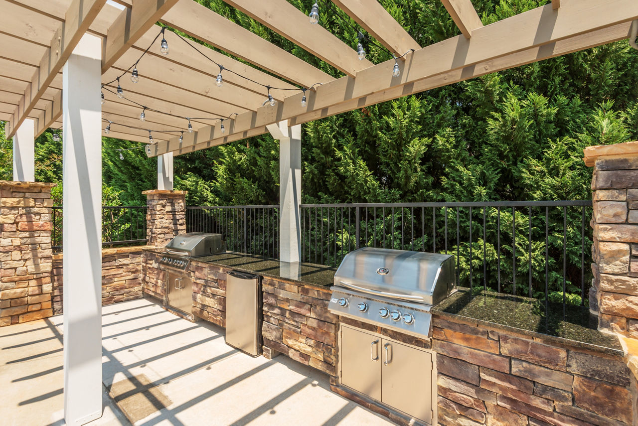 Grill area at The Vinoy At Innovation Park Apartments