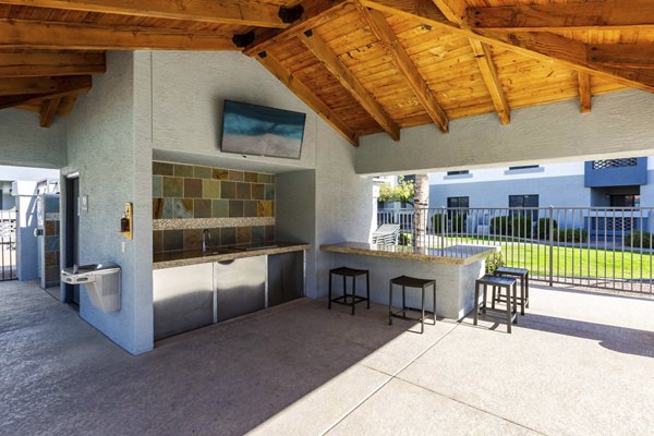 Relaxing patio with desert landscape views at Avana Desert View Apartments, ideal for outdoor enjoyment and gatherings