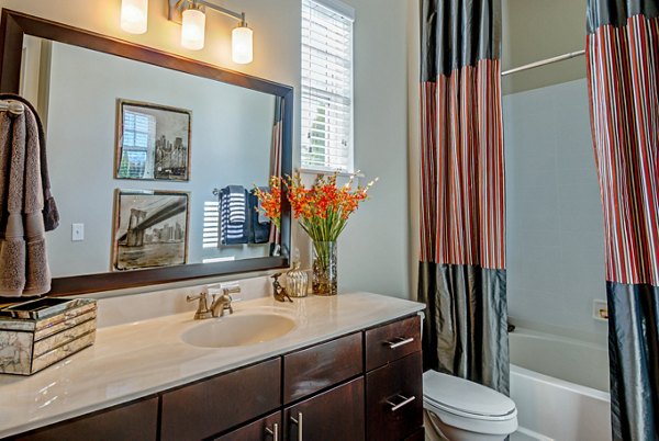 Modern bathroom with sleek fixtures at Whitehall Parc Apartment Homes