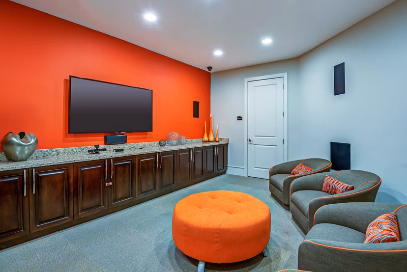 Modern clubhouse with lounge seating at Whitehall Parc Apartment Homes