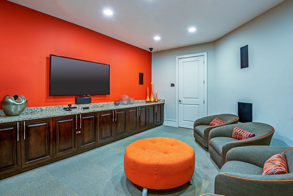 Modern clubhouse with lounge seating at Whitehall Parc Apartment Homes