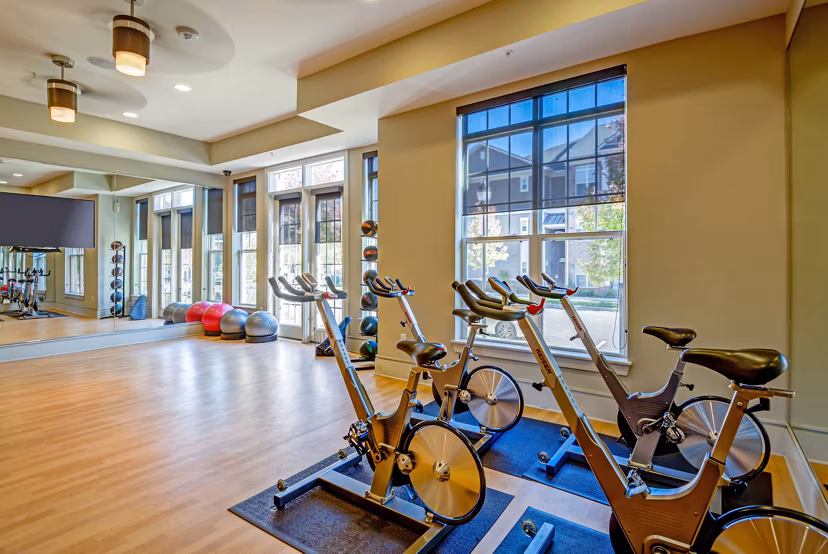 Fitness center with state-of-the-art equipment at Whitehall Parc Apartment Homes for active lifestyle enthusiasts