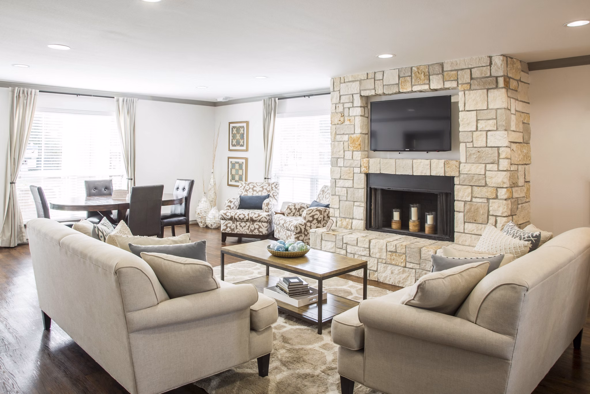 Clubhouse with modern design and comfortable seating at Reserve at Garden Oaks apartments