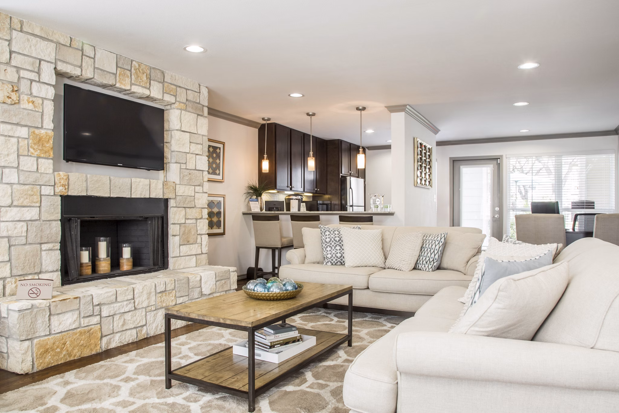 Upscale clubhouse at Reserve at Garden Oaks Apartments featuring stylish seating and modern decor