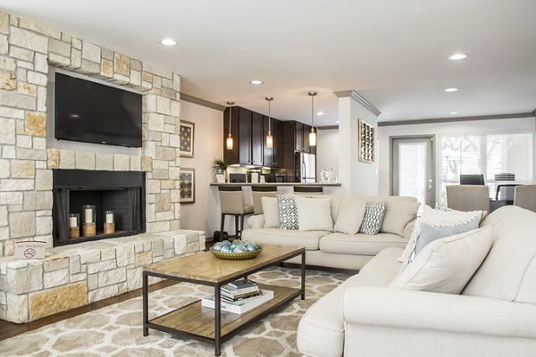 Upscale clubhouse at Reserve at Garden Oaks Apartments featuring stylish seating and modern decor