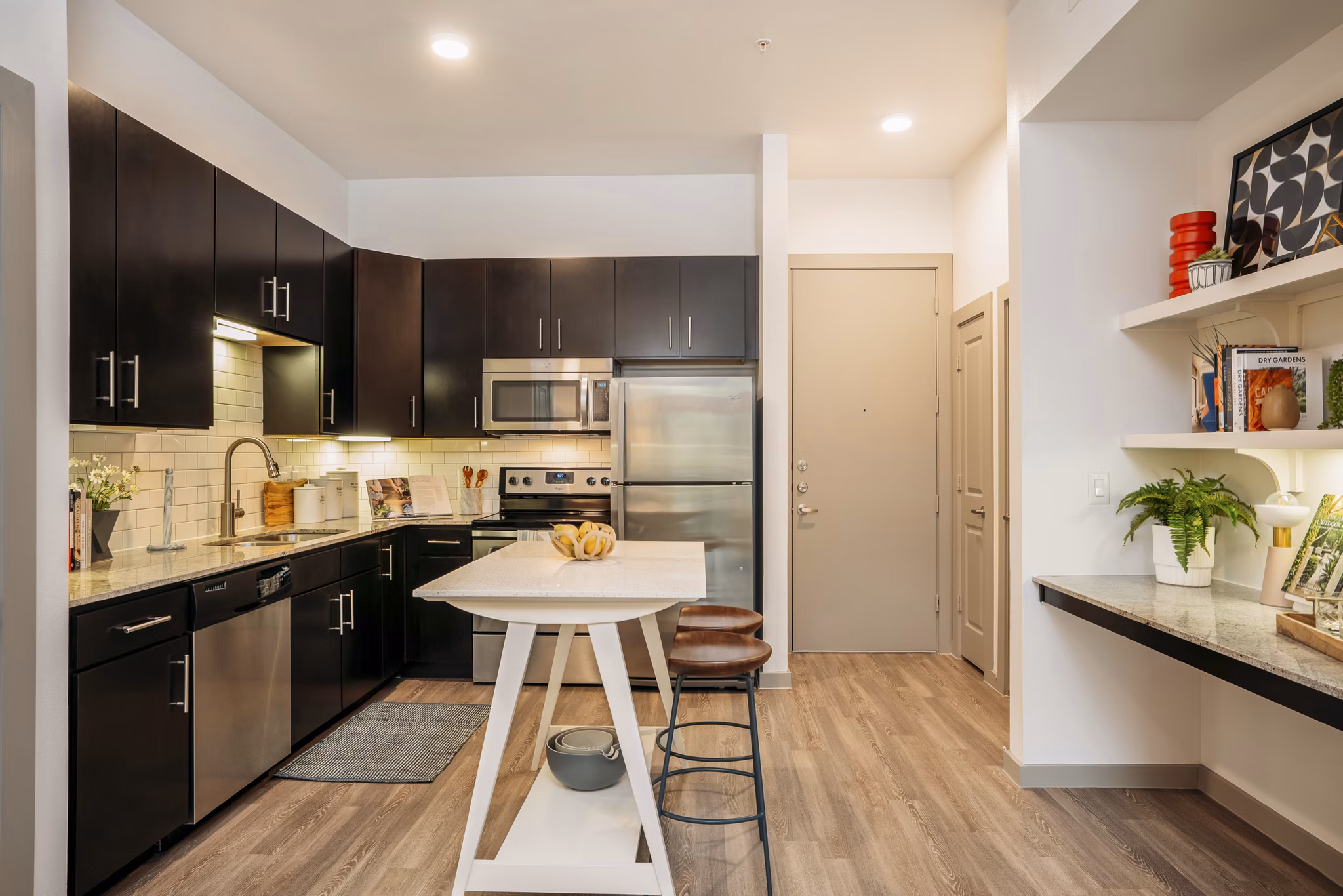 Sleek kitchen with modern appliances in Lakeshore Pearl Apartments, luxury living space