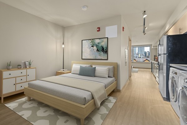 Elegant bedroom with modern decor at 708 Uptown Apartments in luxury community