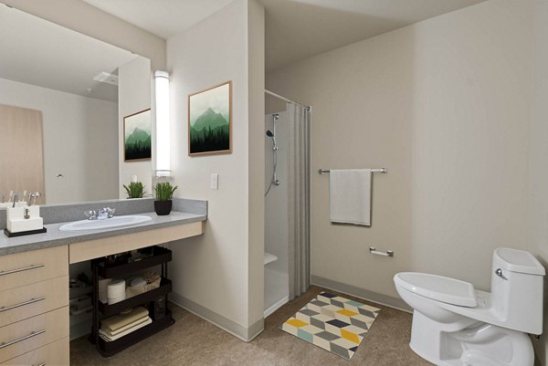 Luxurious bathroom featuring modern fixtures at 708 Uptown Apartments