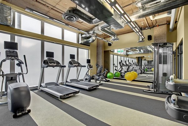 State-of-the-art fitness center with modern equipment at 708 Uptown Apartments for luxury living