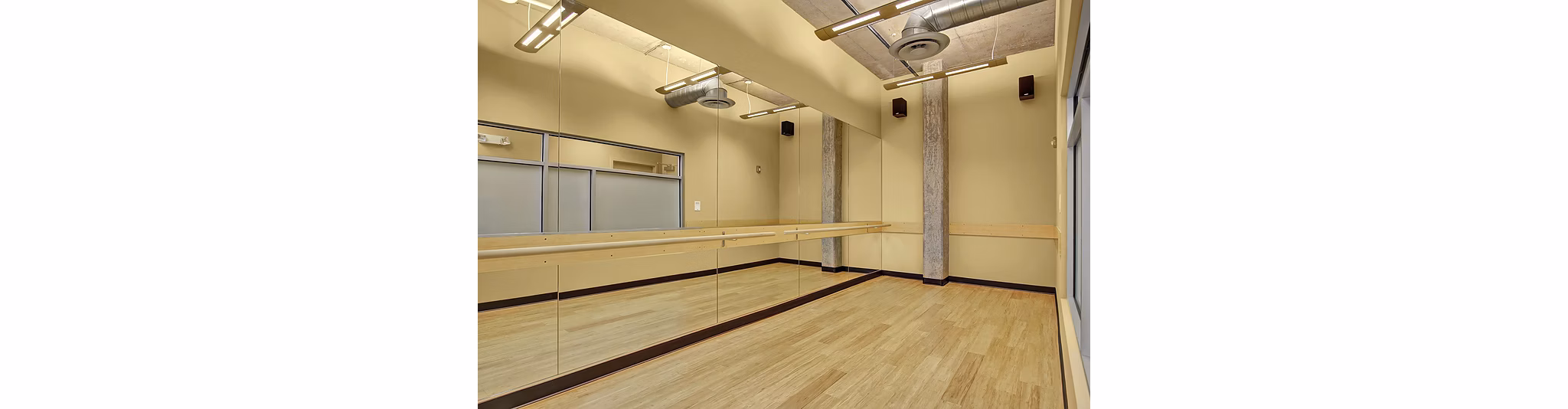 Yoga/spin studio with modern equipment at 708 Uptown Apartments, offering a dynamic fitness experience for residents