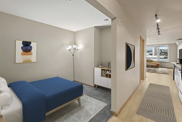 Contemporary hallway with elegant lighting and minimalistic design at 708 Uptown Apartments