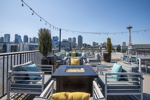 Spacious outdoor patio with elegant seating at 708 Uptown Apartments