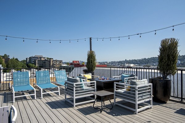 Patio with modern seating at 708 Uptown Apartments offering luxury outdoor living options