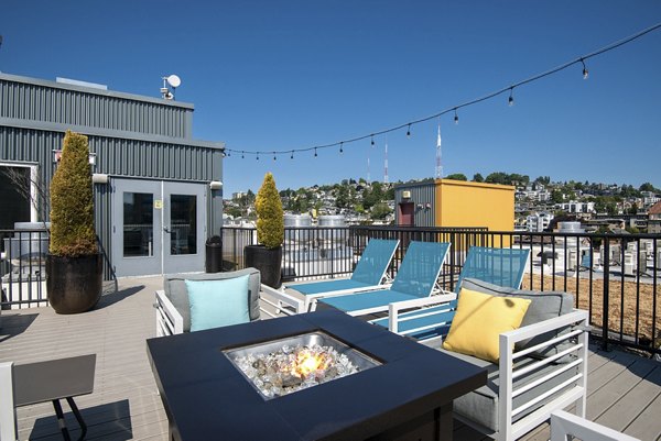 Chic patio space with modern seating arrangements at 708 Uptown Apartments, perfect for relaxing and social gatherings